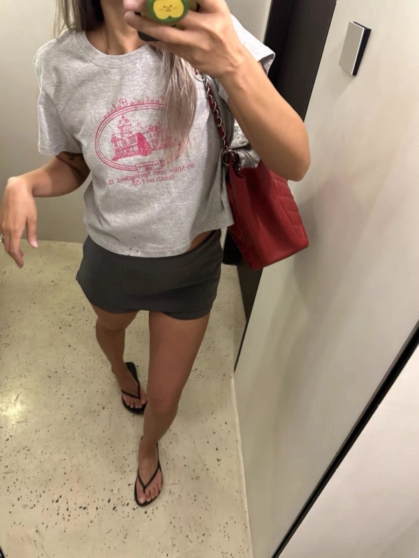 西裝布料低腰顯包臀裙褲A字短裙